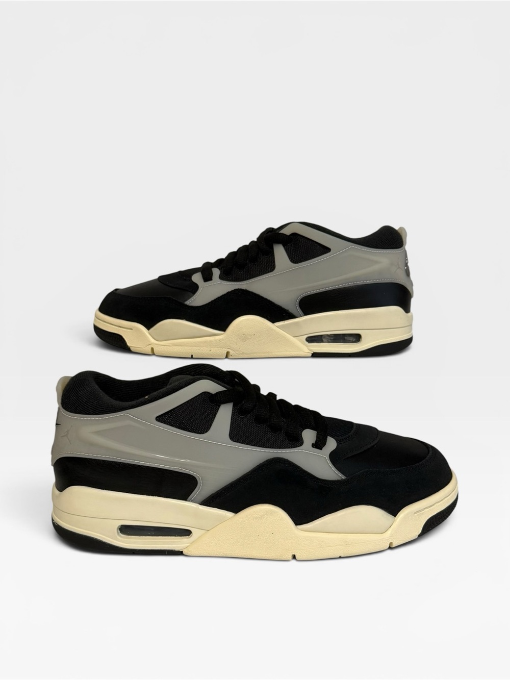 Air Jordan 4 RM Men's Black and Gray Low-Top Sneakers